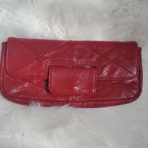 Red patten leather clutch